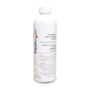 A white bottle of FreshWater Stain and Scale Defense with a white cap. The label features product information, safety warnings, and decorative bubbles along the side.